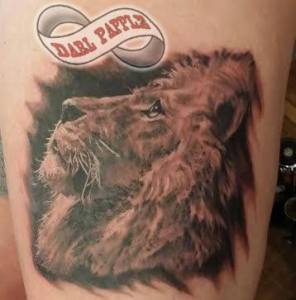 Realistic lion tattoo. Gentle lion tattoo. Beautiful lion tattoo.