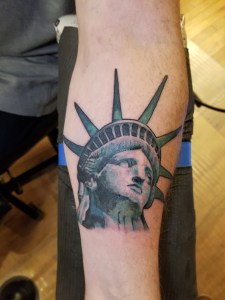 Statue of Liberty tattoo by Darl Papple